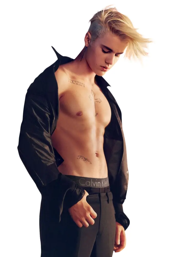Shirtless Person with Tattoos and Black Pants
