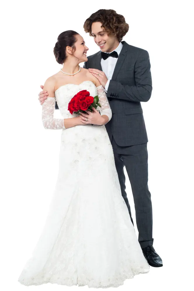 Smiling Bride and Groom in Wedding Attire