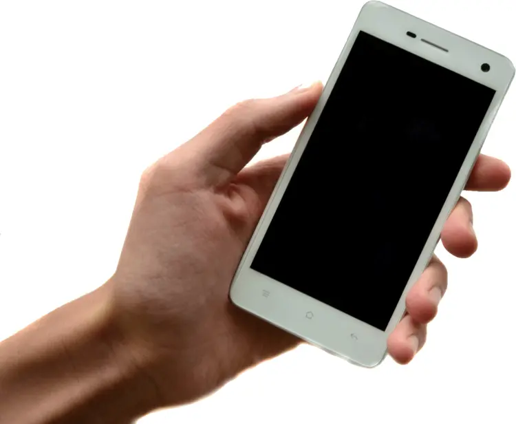White Smartphone Held in Hand
