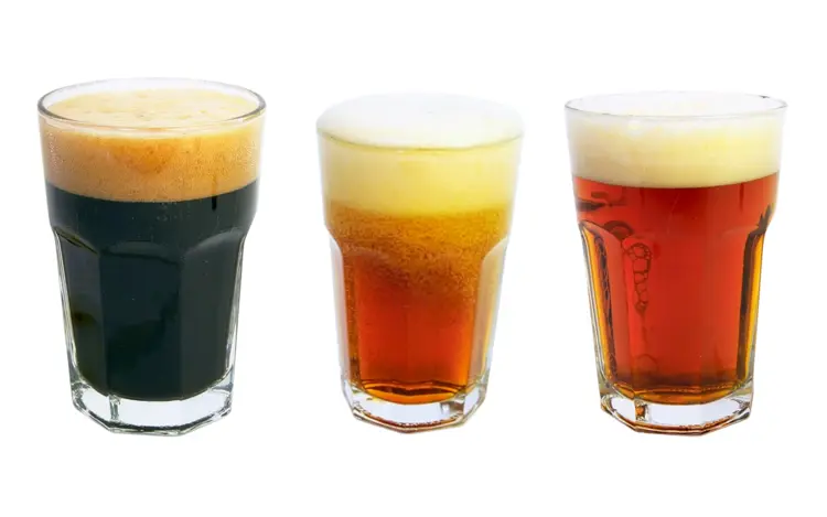 Three Beer Glasses with Foam