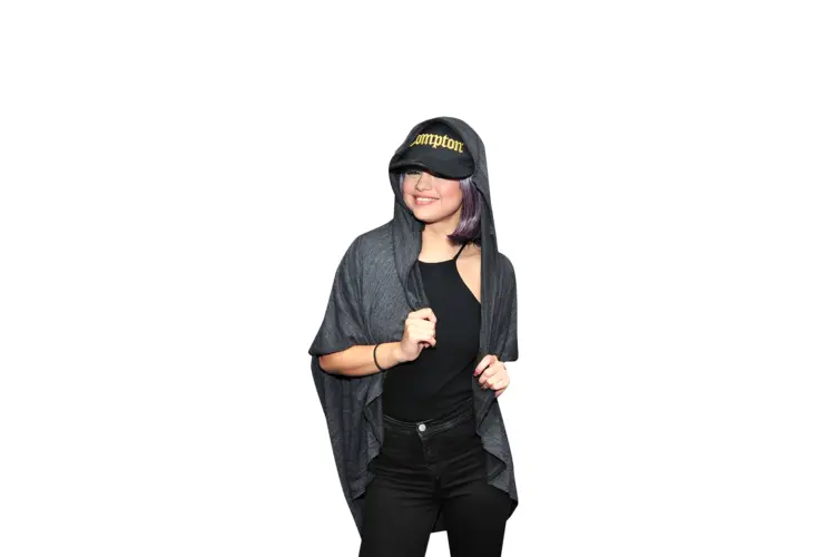 Smiling Woman in Black Outfit with Hat