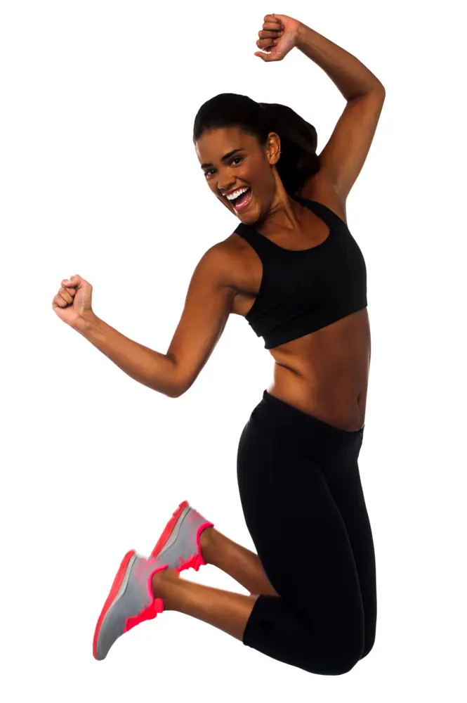 Happy Woman Jumping in Fitness Attire