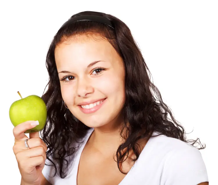 Girl Holding a Green Apple