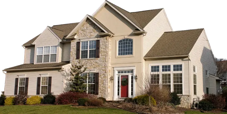 Elegant Stone and Siding House with Red Door