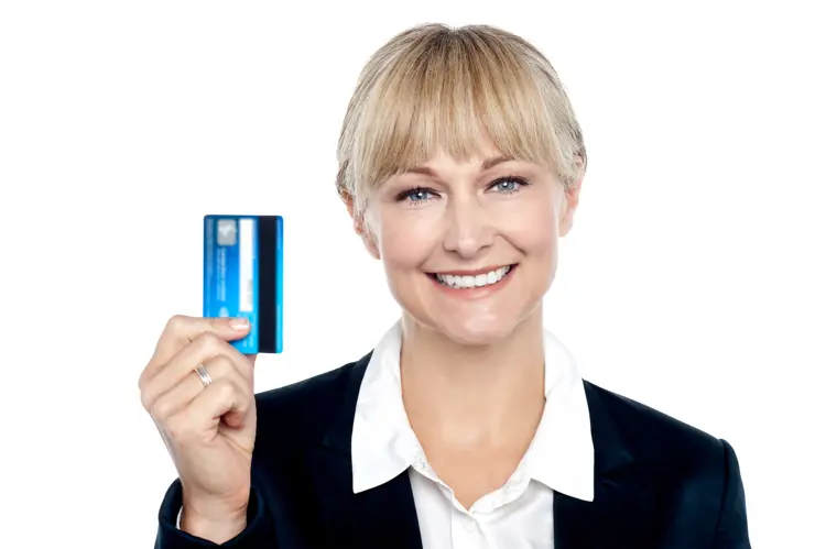 Smiling Woman Holding Credit Card