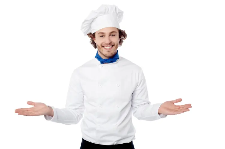 Smiling Chef in White Uniform