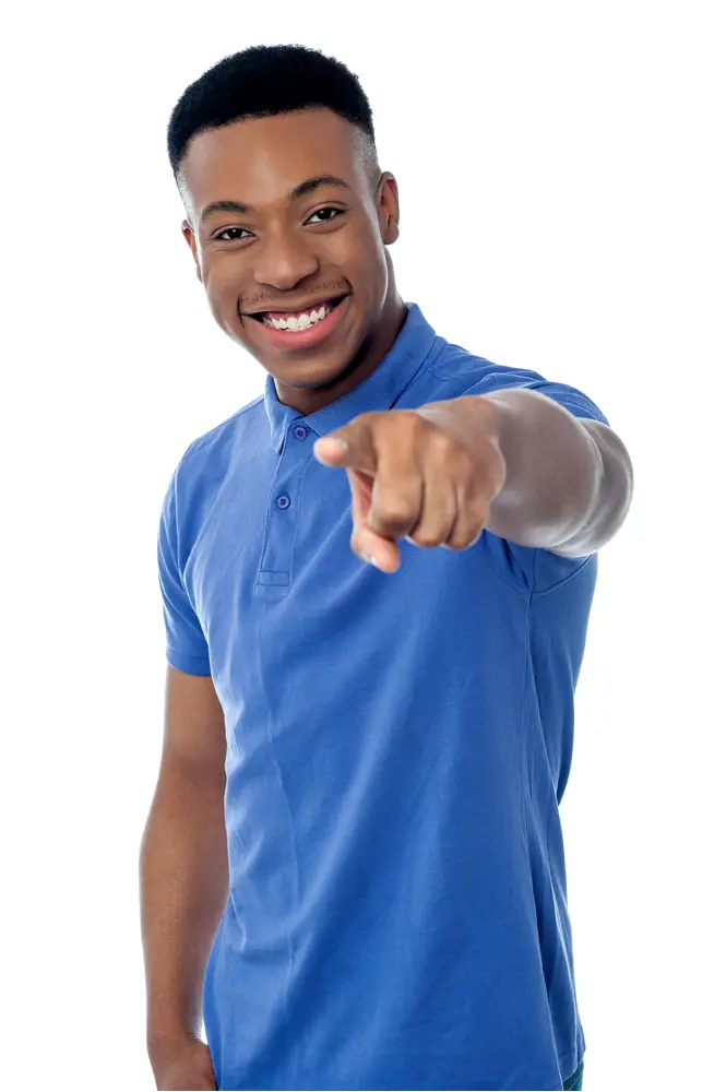 Smiling Man Pointing in Casual Outfit