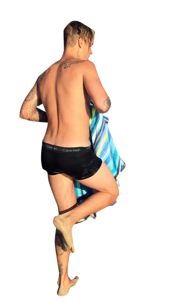 Person in Swimwear with Beach Towel