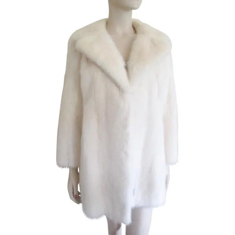 White Fur Coat on Mannequin
