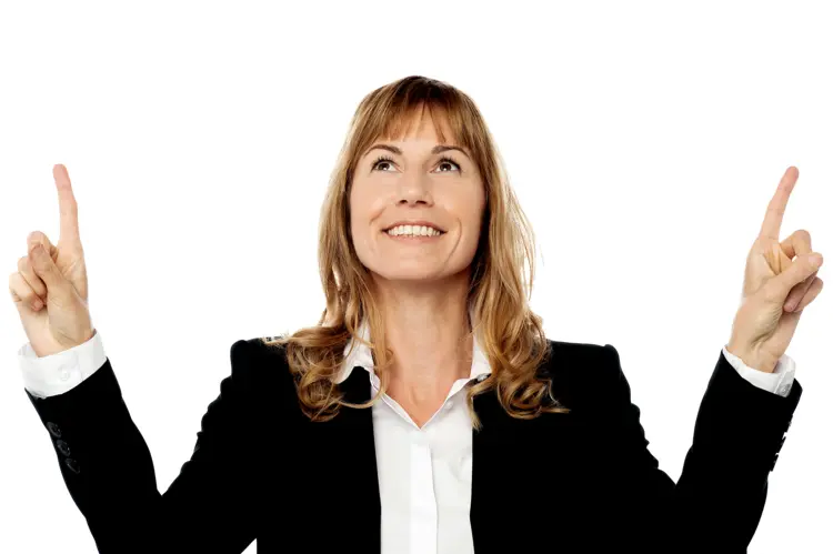 Smiling Woman in Black Suit Pointing Up