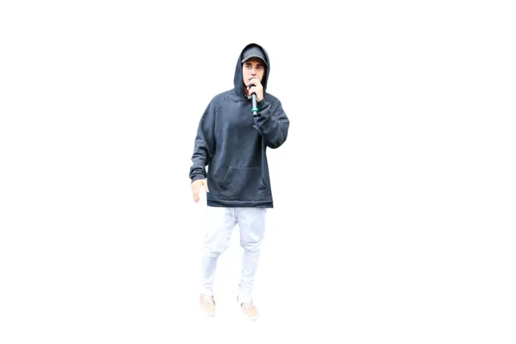Person in Hoodie with Microphone