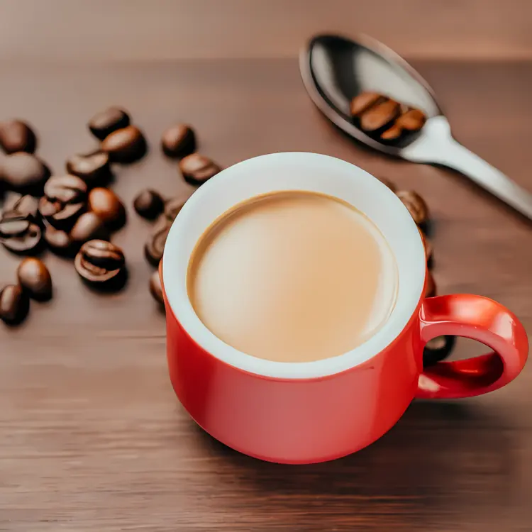 Coffee Cup with Coffee Beans and Spoon