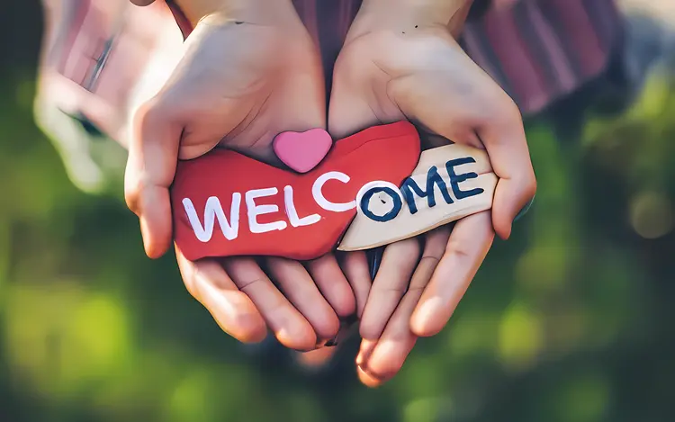 Welcome Text with Heart in Hands