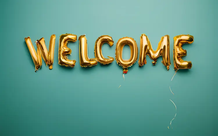 Welcome Sign with Gold Balloons