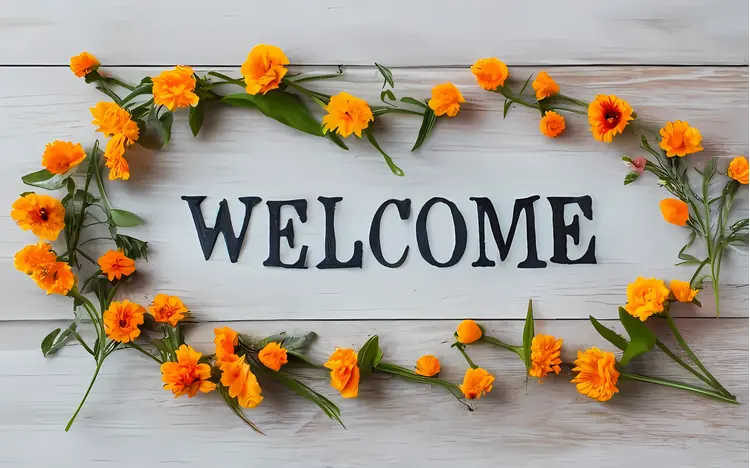 Welcome Text with Flowers on White Background