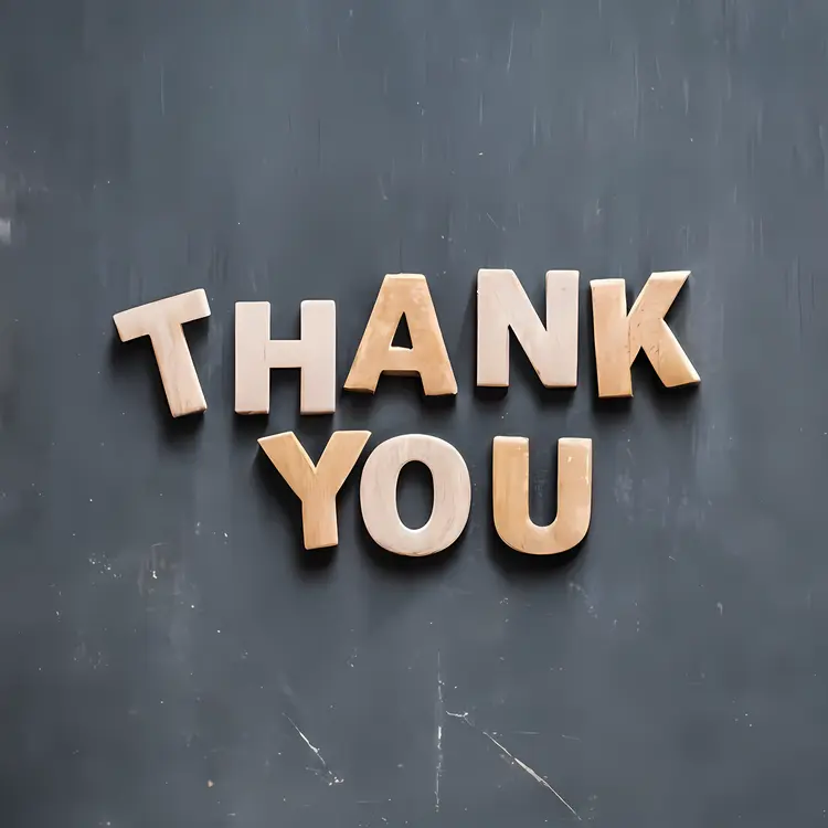 Simple Thank You Letters on Wooden Background