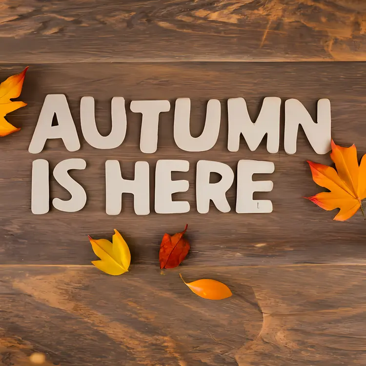 Autumn is Here Sign with Leaves