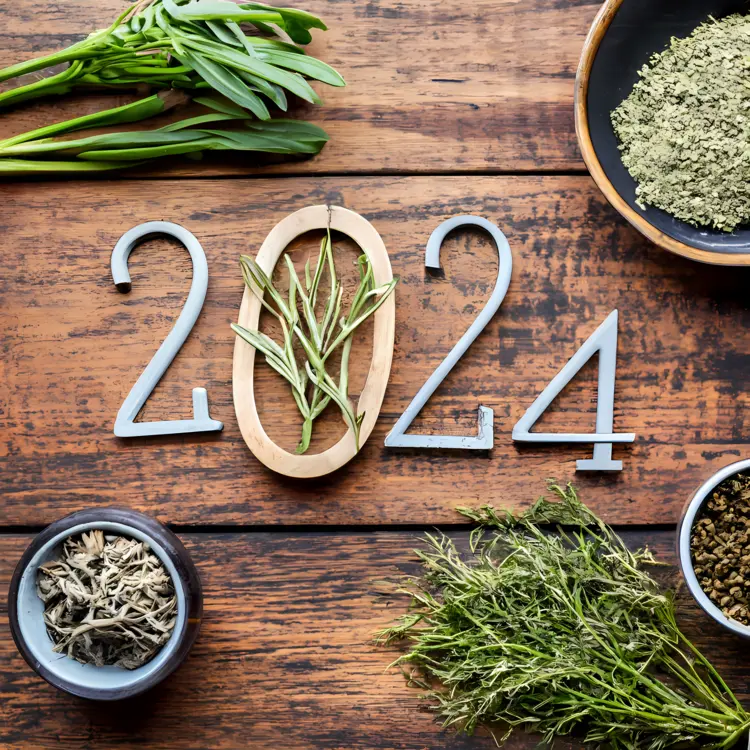 2024 with Herbs on Wooden Table