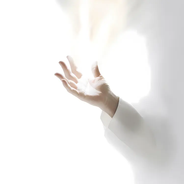 Hand Reaching Out in Divine Light