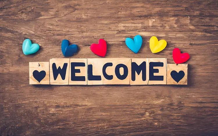 Wooden Welcome with Colorful Hearts