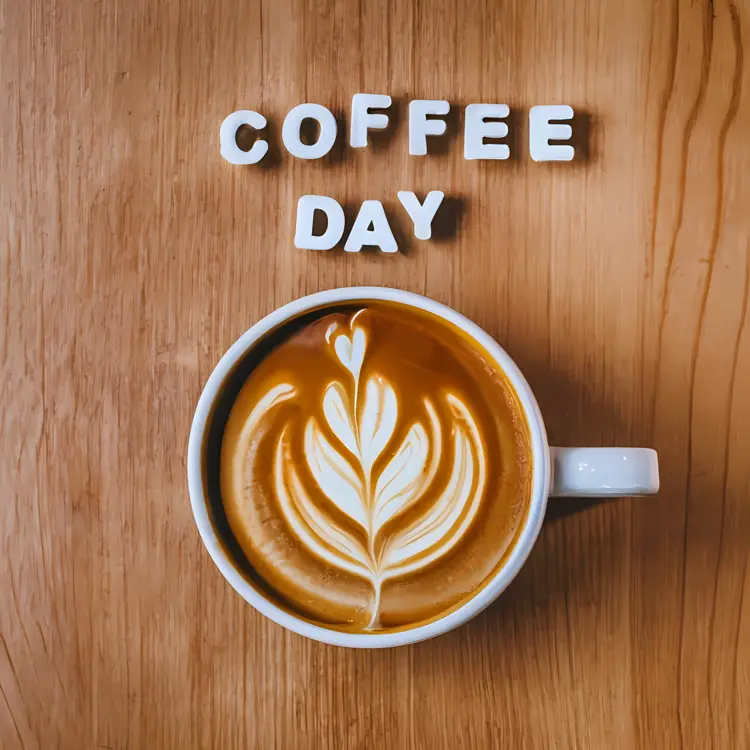 Latte Art on Wooden Table for Coffee Day