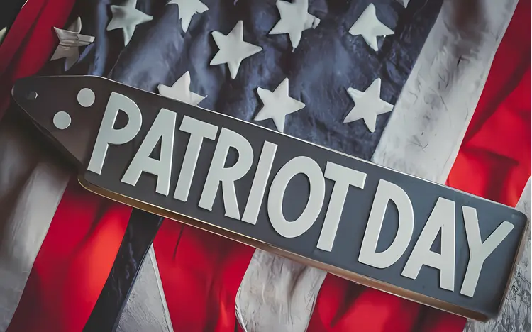 Patriot Day Text on American Flag Background