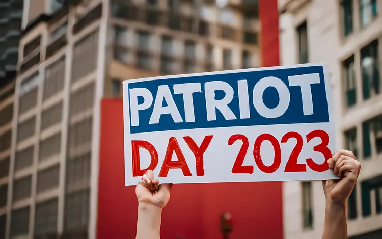 Patriot Day 2023 Sign Held Up