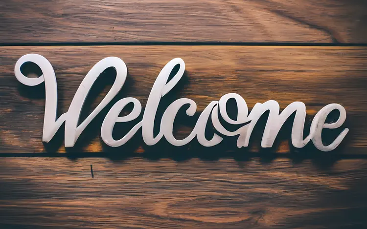 Welcome Text on Wooden Background
